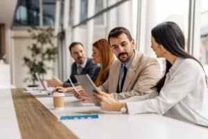 Four managers in a meeting