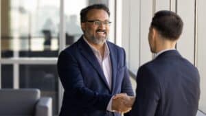 Two businessmen shaking hands
