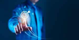 Businessman points on business target