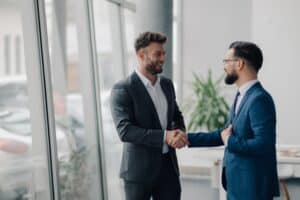 Two businessmen shaking hands