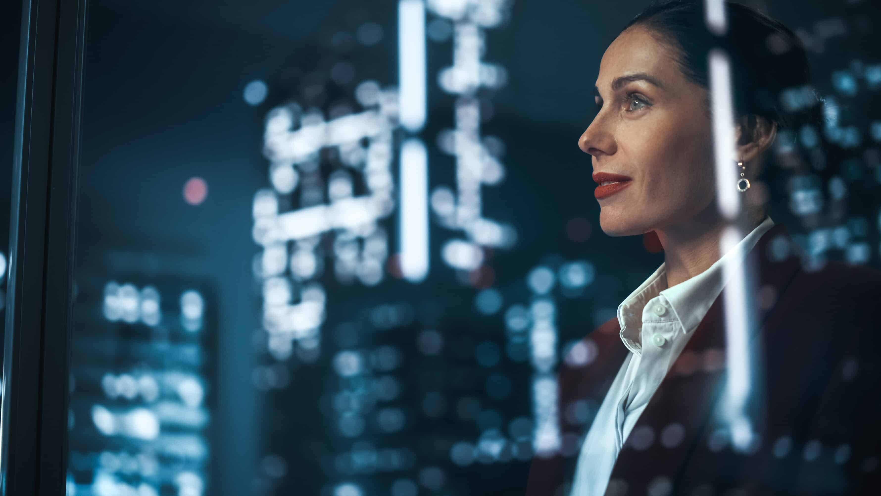 Businesswoman overlooking window in the office