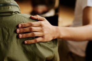 hand on shoulder