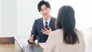 Businessman speaking with client