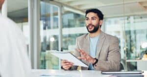 Businessman speaking with a client with a doc
