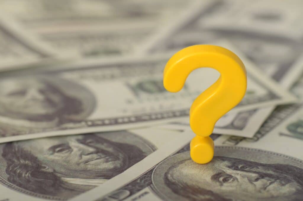 A Yellow Question Mark on cash