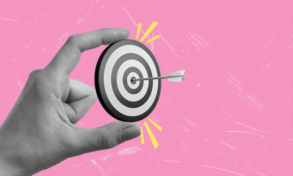 Dart target on hand